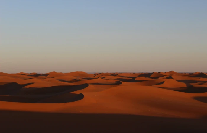 Explore Erg Chegaga on a private 3-day desert tour from Ouarzazate, featuring the Draa Valley, M’Hamid, camel ride and Sahara camp.