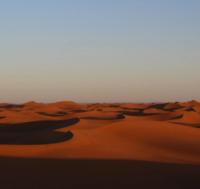 Explore Erg Chegaga on a private 3-day desert tour from Ouarzazate, featuring the Draa Valley, M’Hamid, camel ride and Sahara camp.